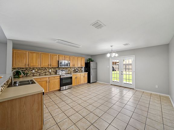 BIG KITCHEN with eat in breakfast area or extra storage or study zone. Stainless appliances, tons of cabinets,