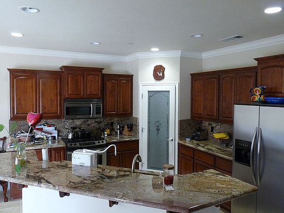 Full Granite Backspash and Pantry