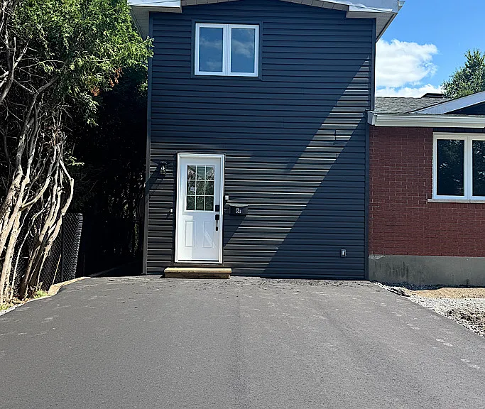 Exterior view of our modern, professionally managed furnished rental home in Ottawa.