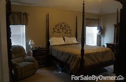 Master Bedroom
						:
						View from the door. The master bath is through the bedroom to the right.