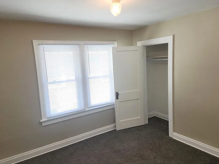 Middle bedroom, 10'5" x 9'10", new carpet, extra outlet installed, two windows, closet
