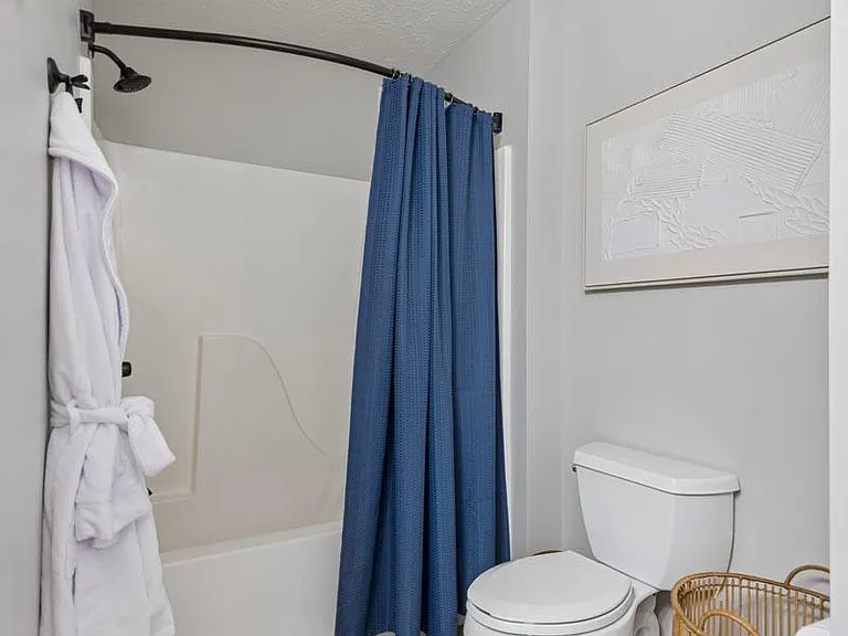 Bright and thoughtfully designed, this bathroom combines modern simplicity with everyday comfort and convenience.