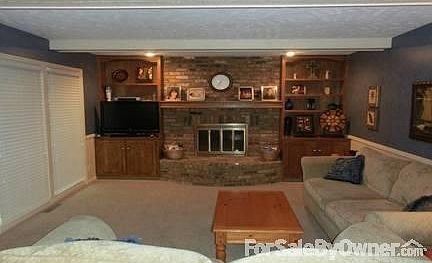 Family room is open to kitchen and back yard. Gas fireplace.