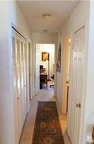 Hallway with indoor laundry,washer and dryer are included.