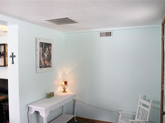 Another view of the front entry showing doorway to the living room.
