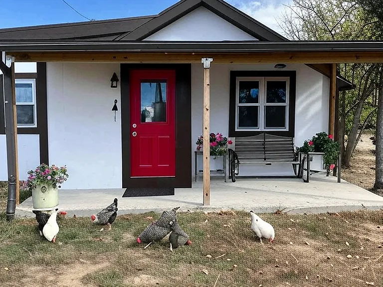 Charming cottage that was once the main ranch-hand house, now the second residence closest to the road on 40 acres. Best sunset view on the property with a peaceful view of undeveloped property as far as the eye can see
