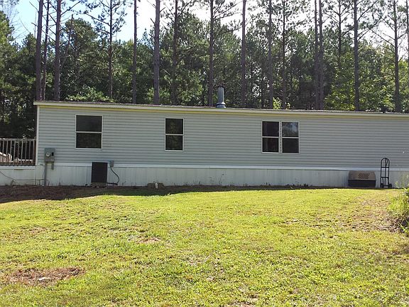 Long rear view of backside of the house.