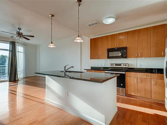 2nd image of 711 Cosmopolitan Dr NE #425
