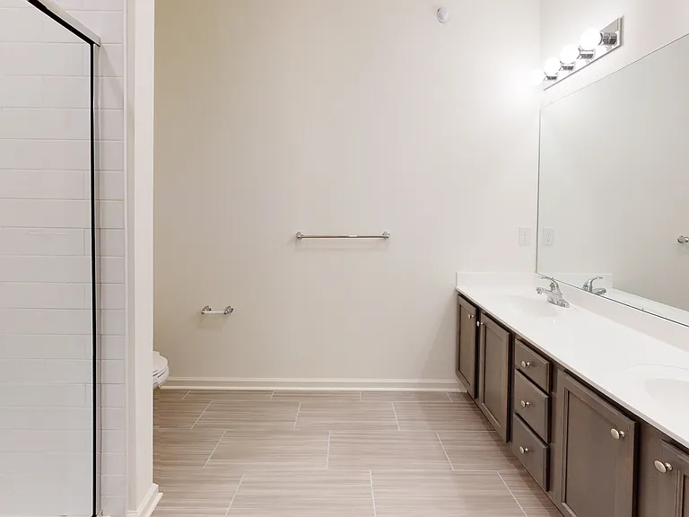 Elevate your lifestyle at Eastampton Village Center, featuring modern bathrooms with sleek finishes and ample space. Enjoy a blend of luxury and comfort in a community designed for your needs. Schedule your tour today!