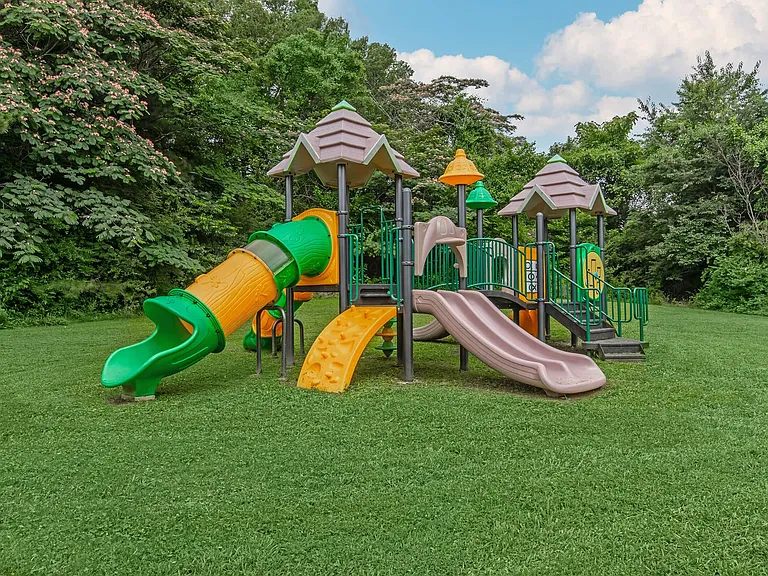 Welcome to Riverwood Park Apartments, where families thrive! Our community features a vibrant playground perfect for outdoor fun and adventure. Enjoy the beauty of nature right at your doorstep. Schedule a visit today to see your new home!