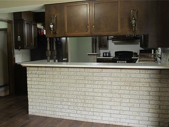 Large kitchen with cherry cabinets