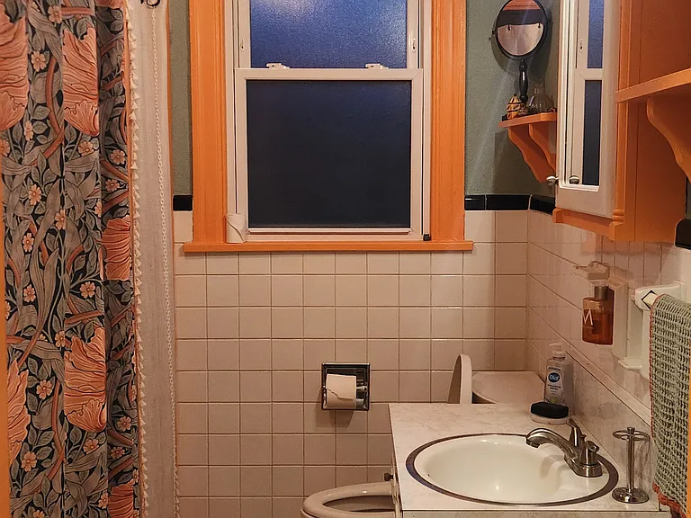Colorful Bathroom with Bath Tub.