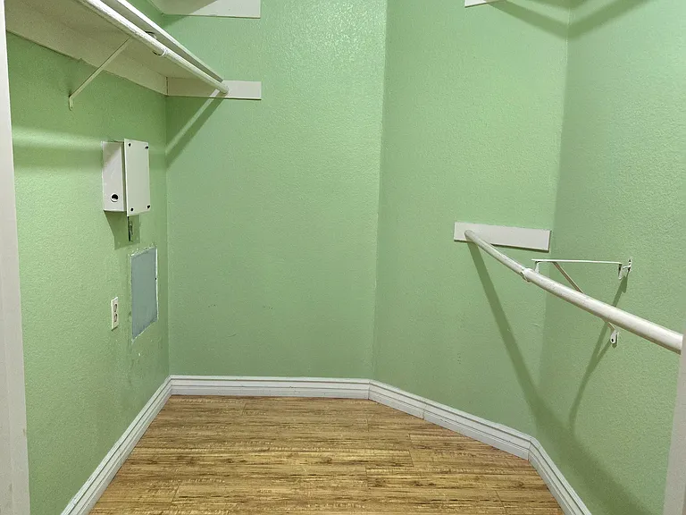 This is a large walk-in closet.