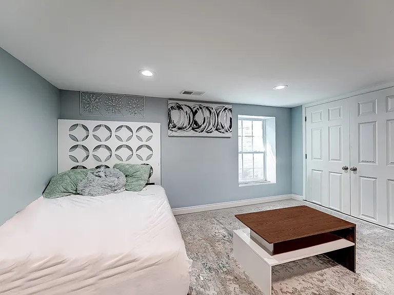 4th bedroom is very large and easily holds queen or king-size bed; large closet to right of bed.