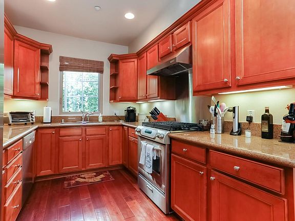 Kitchen with stainless steel appliances and granite counter 