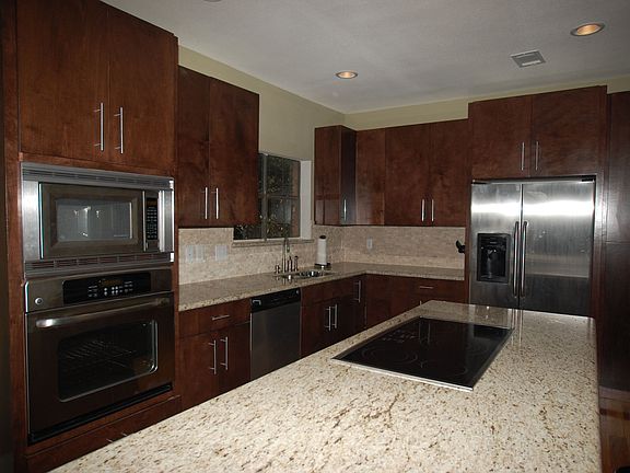 Stainless steel Kitchen, with Bullnose granite, custom cabinets