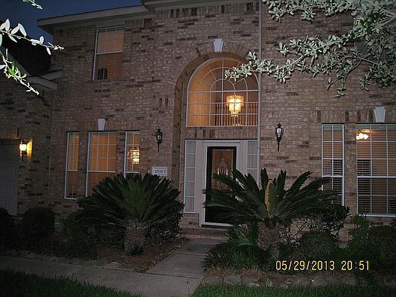 Beautiful brick and lighting in the evening make this home stand out