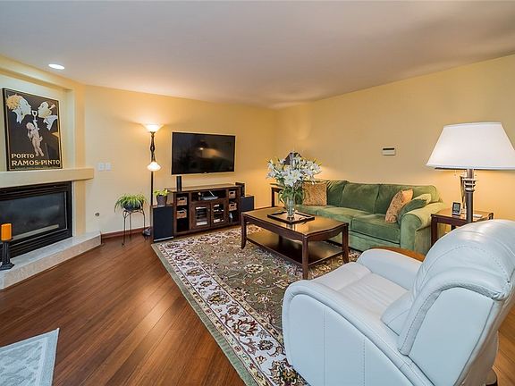 Opulent living room with natural gas fireplace.  
