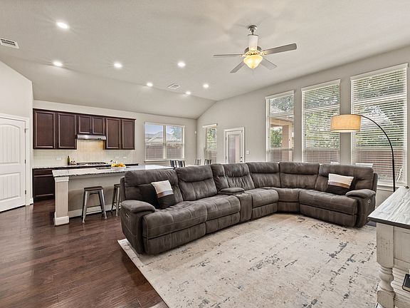 Open-concept living with tall ceilings