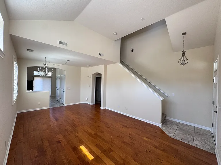 Large open living/dining room: door in center right leads to master.