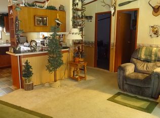 9399 Pine Cr, Rapid City, MI 49676