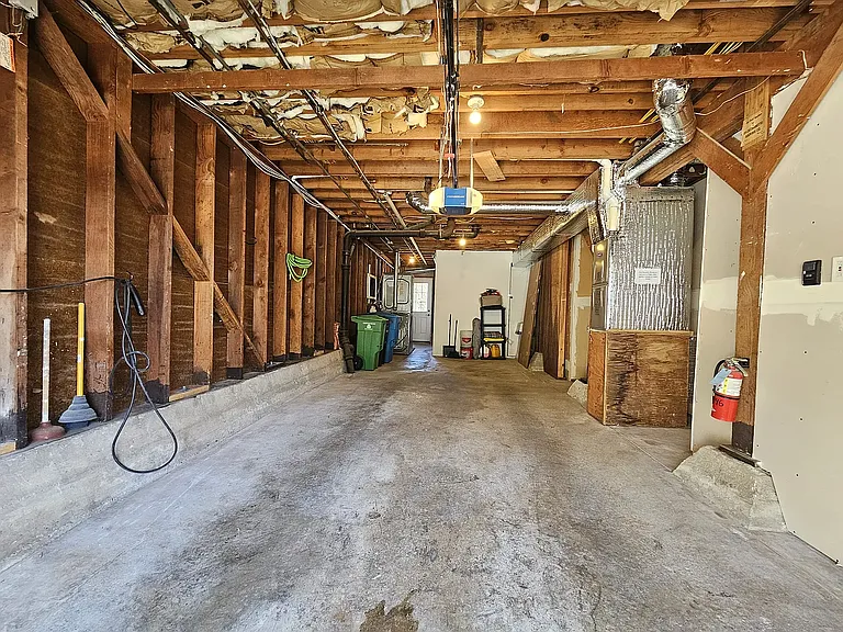 1.5 car garage with EV outlet and garage door opener
