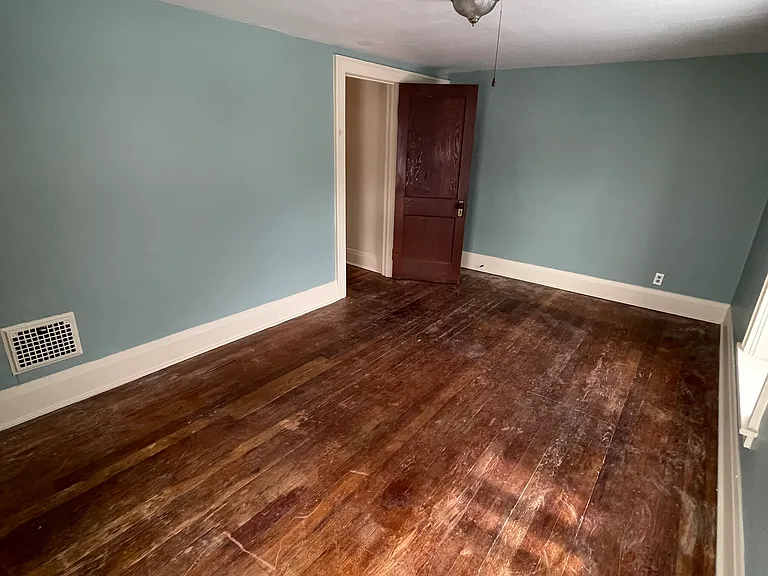 Original hardwood floors throughout entire upstairs, 3 bedrooms. Freshly painted.