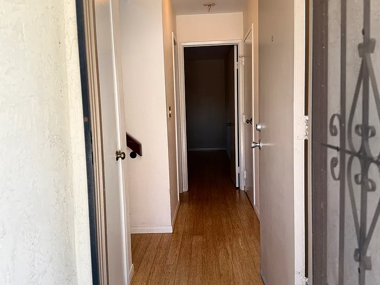 entrance into the condo from the front door.