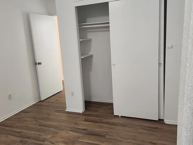 Bedroom #3 has a closet with built-in shelves.