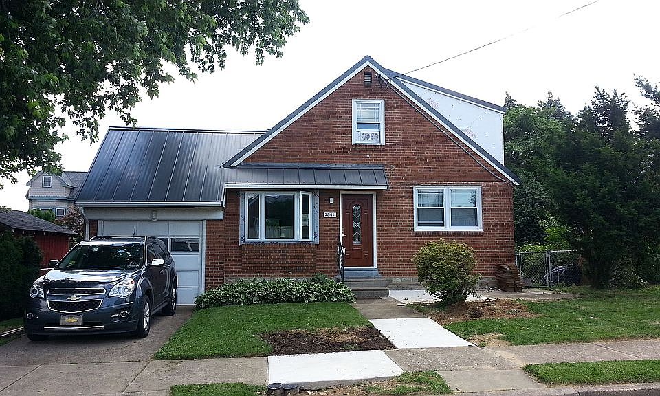 Front finishing up installing Hardie siding for the dormers