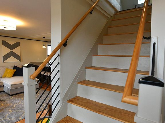 stairs to bedrooms/full bath