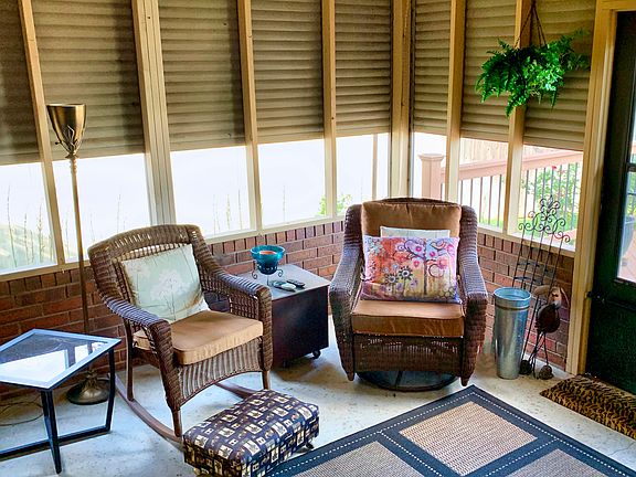 Screened in porch w/shutters