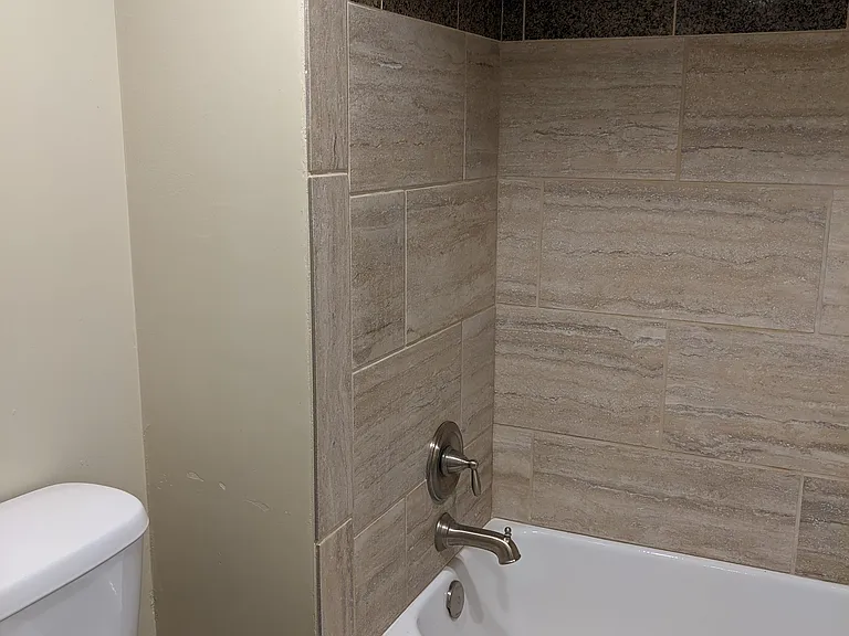 Tile work in shower/tub.