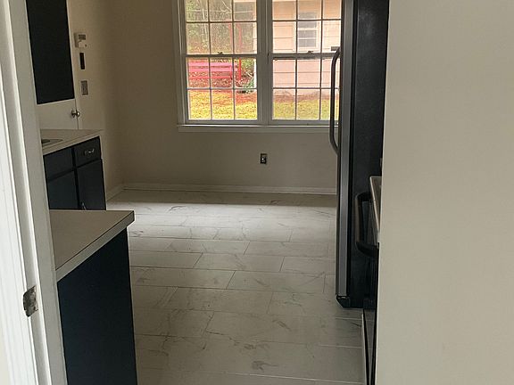 Kitchen showing breakfast area.