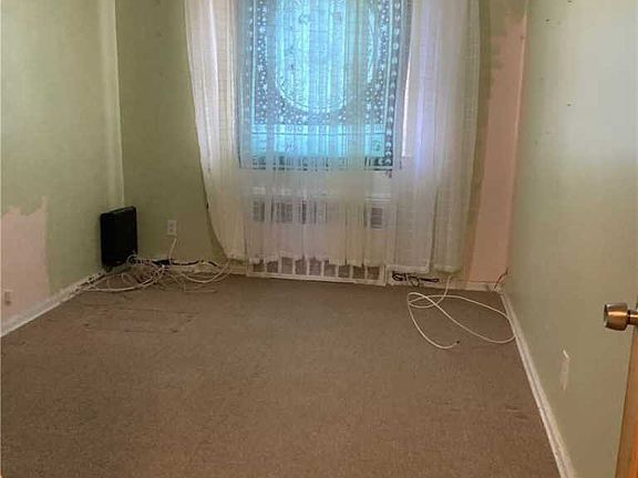 2nd image of 1231 E 83rd St #1231