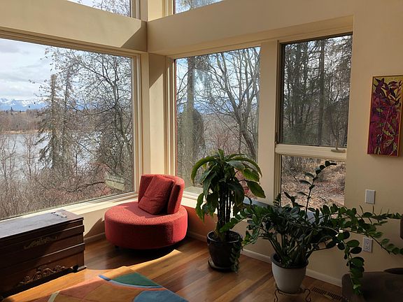 Living room with view overlooking a lagoon (with ice skating in the winter!)