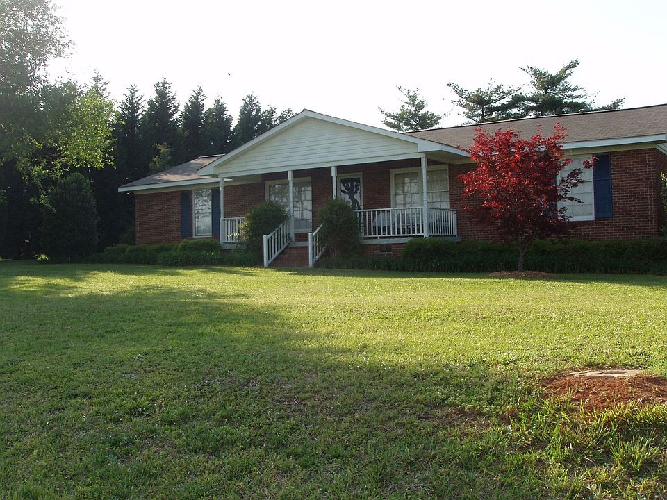 All-brick home on corner lot with great landscaping
