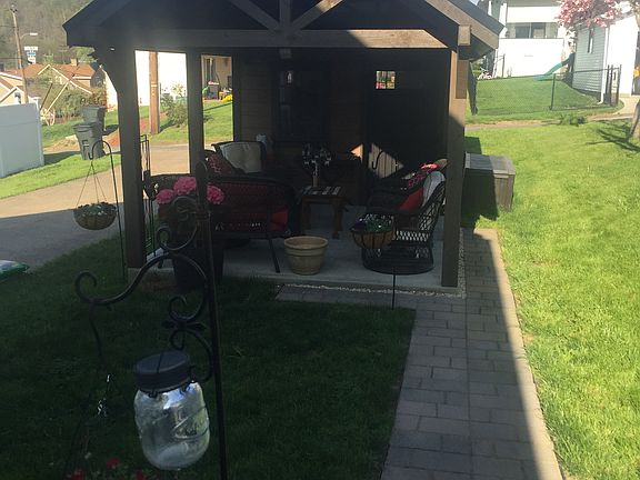 Patio with attached shed