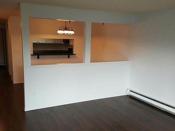 Open sight lines between the living room, dining room and ki