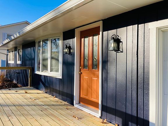Large front deck with room for chairs / table / porch swing.