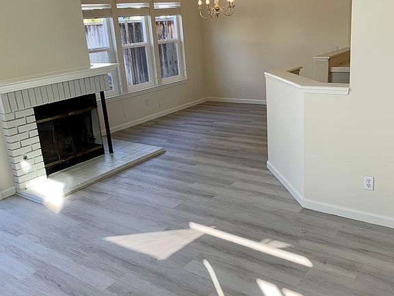 Open floor plan with high ceiling for family room and dining area