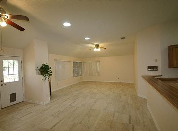 View of family room and breakfast room. Flooring is a beauti