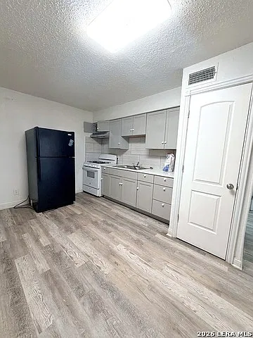 153 E Baylor — Photo 1