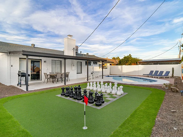Resort Backyard with Putting Green, Giant Chess and Heated Pool