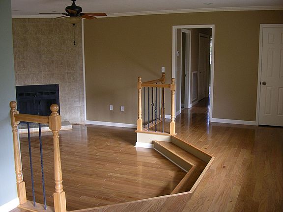 sunken living room w/fireplace