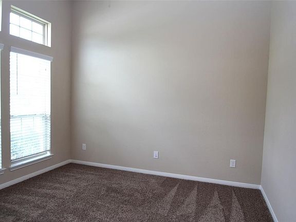 Study up front with french doors for privacy