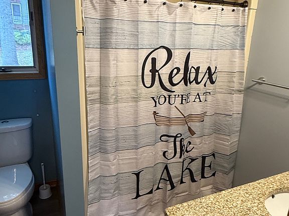 Main floor full bathroom with tub