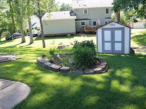 Storage Shed & Fire Pit