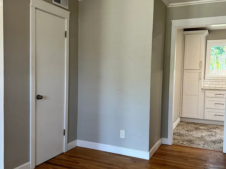 Looking into kitchen from dining room.
Storage closet on the left.