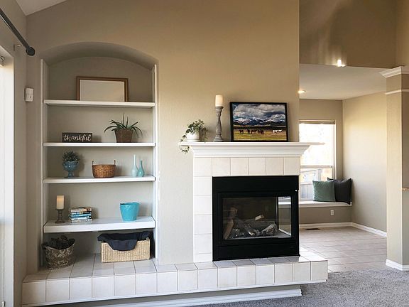 Hang out in front of the gas fire In the open family room, kitchen and dining area. We just painted and re-carpeted this family room, living room, and master suite.
